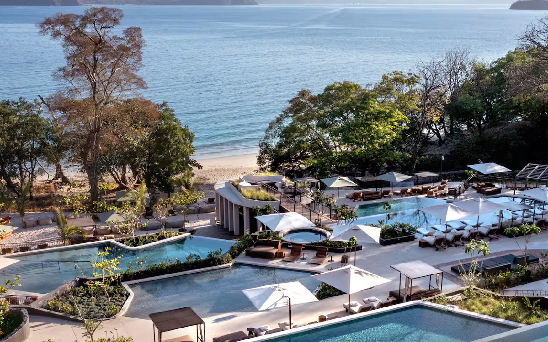 Aerial view of tiered pools above the beach at Waldorf Astoria Costa Rica